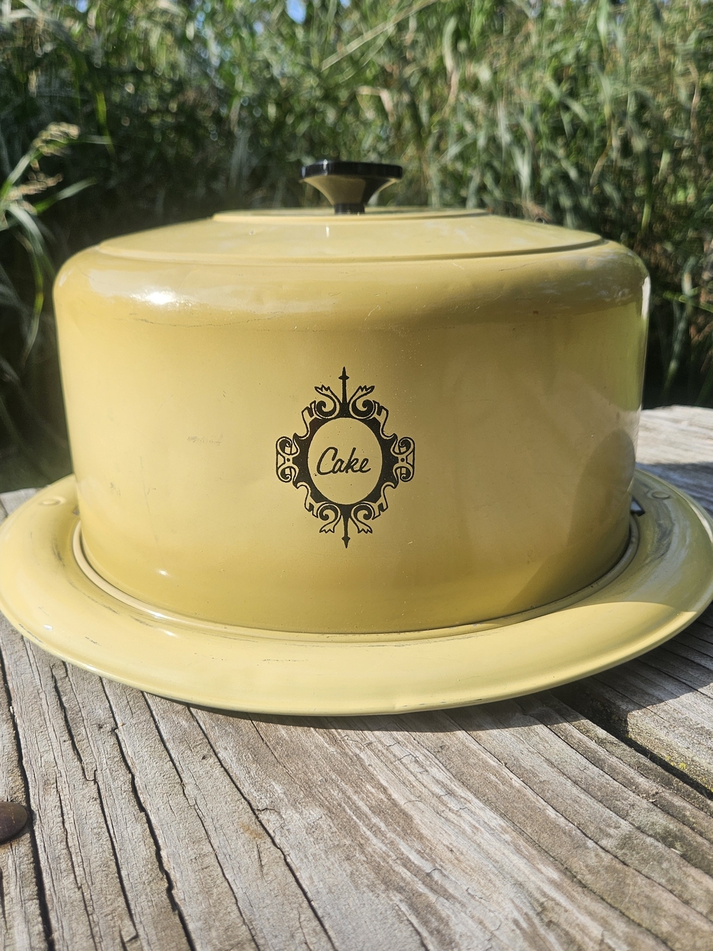 Yellow Cake Keeper with Decorative Emblem